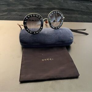 Gucci L'Aveugle Par Amour Round Frame Sunglasses GG0113S